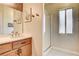 Bathroom featuring a tiled floor and shower with glass door at 67 Dow Jones St # 2, Henderson, NV 89074