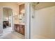 Bathroom featuring a tiled floor and shower with glass door at 67 Dow Jones St # 2, Henderson, NV 89074