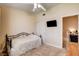 Bedroom featuring neutral tones, a ceiling fan, and a doorway at 67 Dow Jones St # 2, Henderson, NV 89074