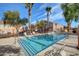 Well-maintained community pool area with lounge chairs and inviting atmosphere for residents at 67 Dow Jones St # 2, Henderson, NV 89074