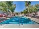 Refreshing community pool with clear blue water, perfect for relaxation and summer fun at 67 Dow Jones St # 2, Henderson, NV 89074