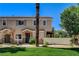 Charming two-story townhome with a well-manicured lawn and cozy front porch at 67 Dow Jones St # 2, Henderson, NV 89074