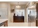 Bright kitchen featuring modern appliances, ample counter space, and natural light from the window and decorative accents at 67 Dow Jones St # 2, Henderson, NV 89074