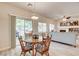 This comfortable living room features backyard access through a sliding glass door at 67 Dow Jones St # 2, Henderson, NV 89074
