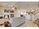 Bright living room featuring fireplace, wood-look floors, and an open layout at 67 Dow Jones St # 2, Henderson, NV 89074