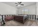 Bedroom with a ceiling fan and carpeted floors, offering a comfortable and private space at 7001 Via Locanda Ave, Las Vegas, NV 89131