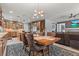 Inviting dining area open to the kitchen with views into the living room at 7001 Via Locanda Ave, Las Vegas, NV 89131
