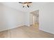 Well-lit bedroom featuring laminate floors and a ceiling fan at 705 Coastal Lagoon St, Henderson, NV 89002