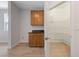Kitchen nook with a cabinet and countertop next to a walk-in pantry at 705 Coastal Lagoon St, Henderson, NV 89002