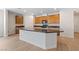 Kitchen island with granite countertops and ample cabinet space at 705 Coastal Lagoon St, Henderson, NV 89002