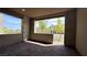 Open-air balcony with views of the surrounding neighborhood and stylish brick flooring at 754 Agate Hills St, Las Vegas, NV 89138
