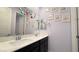 Upstairs bathroom with double sinks and light purple wall decor, perfect for a Gathering at 754 Agate Hills St, Las Vegas, NV 89138
