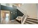 Welcoming foyer with stairs, bench, and an open floor plan offers a grand entrance at 754 Agate Hills St, Las Vegas, NV 89138
