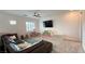 Cozy upstairs media room with a sofa, TV, and custom storage units, perfect for Gathering entertainment at 754 Agate Hills St, Las Vegas, NV 89138