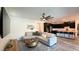 Spacious living room open to kitchen, featuring hardwood floors and stylish decor at 754 Agate Hills St, Las Vegas, NV 89138