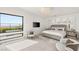 Bright bedroom with luxurious bedding, scenic views, and modern decor at 826 Bolide St, Las Vegas, NV 89138