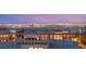 Expansive city views at night from rooftop deck showcase the vibrant skyline at 826 Bolide St, Las Vegas, NV 89138
