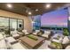Covered patio with stylish seating offers stunning views and a comfortable space for outdoor living at 826 Bolide St, Las Vegas, NV 89138