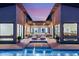 Inviting pool with lounge chairs and serene courtyard, creating a luxurious outdoor retreat at 826 Bolide St, Las Vegas, NV 89138
