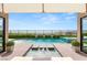 Inviting backyard pool and hot tub with luxurious lounge chairs and manicured landscaping at 826 Bolide St, Las Vegas, NV 89138