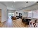 Bright living room features wood floors, recessed lighting and a modern fireplace at 8640 Trafalgar Dr, Las Vegas, NV 89117