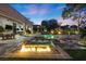 Expansive backyard with pool, spa, fire features, outdoor dining, and lounge areas, ideal for outdoor living at 9 Clear Crossing Trl, Henderson, NV 89052