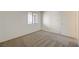 Bedroom with neutral carpet and a window that has blinds at 950 Seven Hills Dr # 1921, Henderson, NV 89052