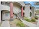 Apartment building showcasing well-kept landscaping and convenient access stairs at 950 Seven Hills Dr # 1921, Henderson, NV 89052