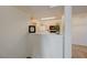 View of the bright kitchen featuring light cabinets, white refrigerator, and black microwave at 950 Seven Hills Dr # 1921, Henderson, NV 89052