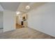 Open-concept living space showcases plush carpeting, kitchen access, and plenty of natural light at 950 Seven Hills Dr # 1921, Henderson, NV 89052