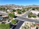 Residential streets with mature landscaping and beautiful mountain view in the distance at 1006 Winding Hill St, Henderson, NV 89002