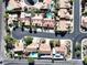 An overhead view of houses in a neighborhood, each with a pool and desert landscaping at 1006 Winding Hill St, Henderson, NV 89002