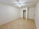 Neutral bedroom featuring hardwood floors, a closet with doors, and a ceiling fan at 1006 Winding Hill St, Henderson, NV 89002