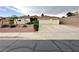 Charming single-story home featuring a two-car garage and low maintenance landscaping at 1006 Winding Hill St, Henderson, NV 89002