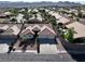 Inviting single-story home with desert landscaping, tile roof, and a convenient three-car garage at 1006 Winding Hill St, Henderson, NV 89002