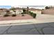 Well-maintained single-story home with a two-car garage and low maintenance desert landscaping at 1006 Winding Hill St, Henderson, NV 89002