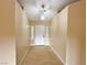 Bright foyer with wood floors and a chandelier that welcomes guests at 1006 Winding Hill St, Henderson, NV 89002