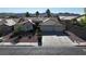 Charming single-story home featuring a well-maintained yard and a three-car garage at 1006 Winding Hill St, Henderson, NV 89002
