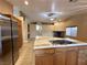 Bright kitchen with stainless appliances, a center island, and modern finishes at 1006 Winding Hill St, Henderson, NV 89002