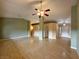 Large living room featuring a ceiling fan and neutral color palette at 1006 Winding Hill St, Henderson, NV 89002