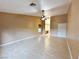 Spacious living room with a ceiling fan, wood floors, and a view into another room at 1006 Winding Hill St, Henderson, NV 89002