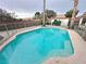 Private pool area surrounded by a safety fence, perfect for Gathering enjoyment at 1006 Winding Hill St, Henderson, NV 89002