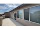 Spacious balcony showcasing stucco columns and views of the neighborhood landscape at 10066 Golden Bluff Ave, Las Vegas, NV 89148
