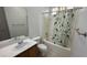 Bathroom featuring a shower-tub combo and vanity at 10066 Golden Bluff Ave, Las Vegas, NV 89148