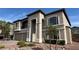Stunning two-story home with a landscaped front yard and a two-car garage at 10066 Golden Bluff Ave, Las Vegas, NV 89148