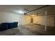 Spacious two-car garage with ample storage and a door leading to the interior at 10066 Golden Bluff Ave, Las Vegas, NV 89148