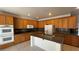 Well-equipped kitchen featuring granite countertops, modern appliances, and ample cabinet space at 10066 Golden Bluff Ave, Las Vegas, NV 89148