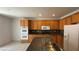 Modern kitchen boasting granite countertops, stainless steel appliances, and ample cabinet storage at 10066 Golden Bluff Ave, Las Vegas, NV 89148