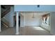 Bright living room with a staircase and an open floor plan at 10066 Golden Bluff Ave, Las Vegas, NV 89148