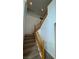 Staircase with neutral carpet and a wood handrail at 10066 Golden Bluff Ave, Las Vegas, NV 89148